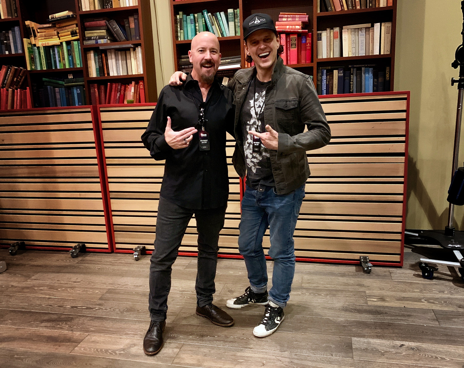 DAVID POSES WITH VOCALIST CRISTIAN BURNS